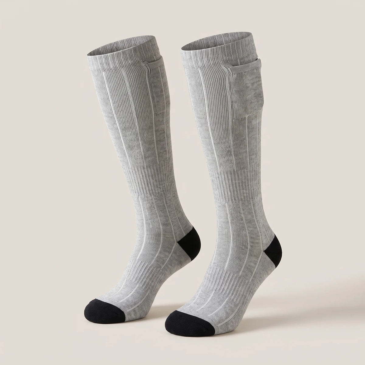BergHeat Stomp 2.0 heated knee-high socks in grey with black heel and cuff pocket