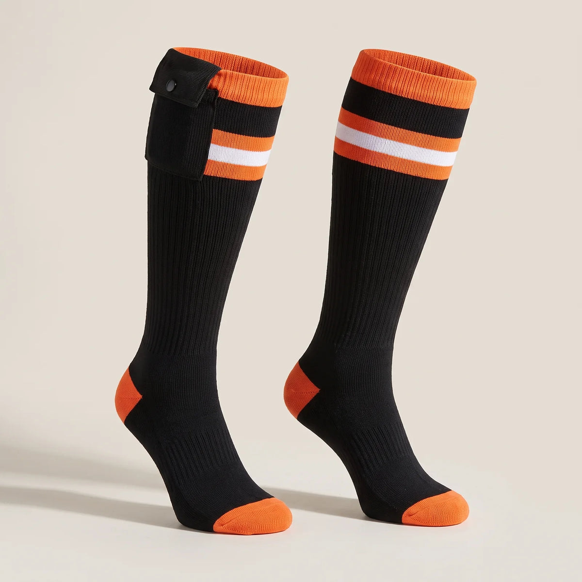 BergHeat Stomp 2.0 heated knee-high socks in black-orange with striped cuff